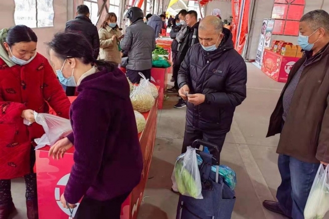 日投放万余吨农产品保障春供，苏州南环桥市场首届年货节启动